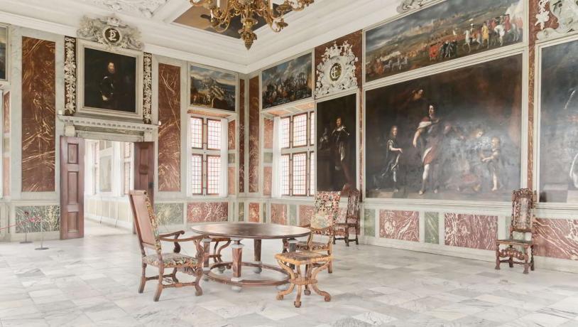 The audience hall at Frederiksborg Castle with extravagant decoration in the 18th century.